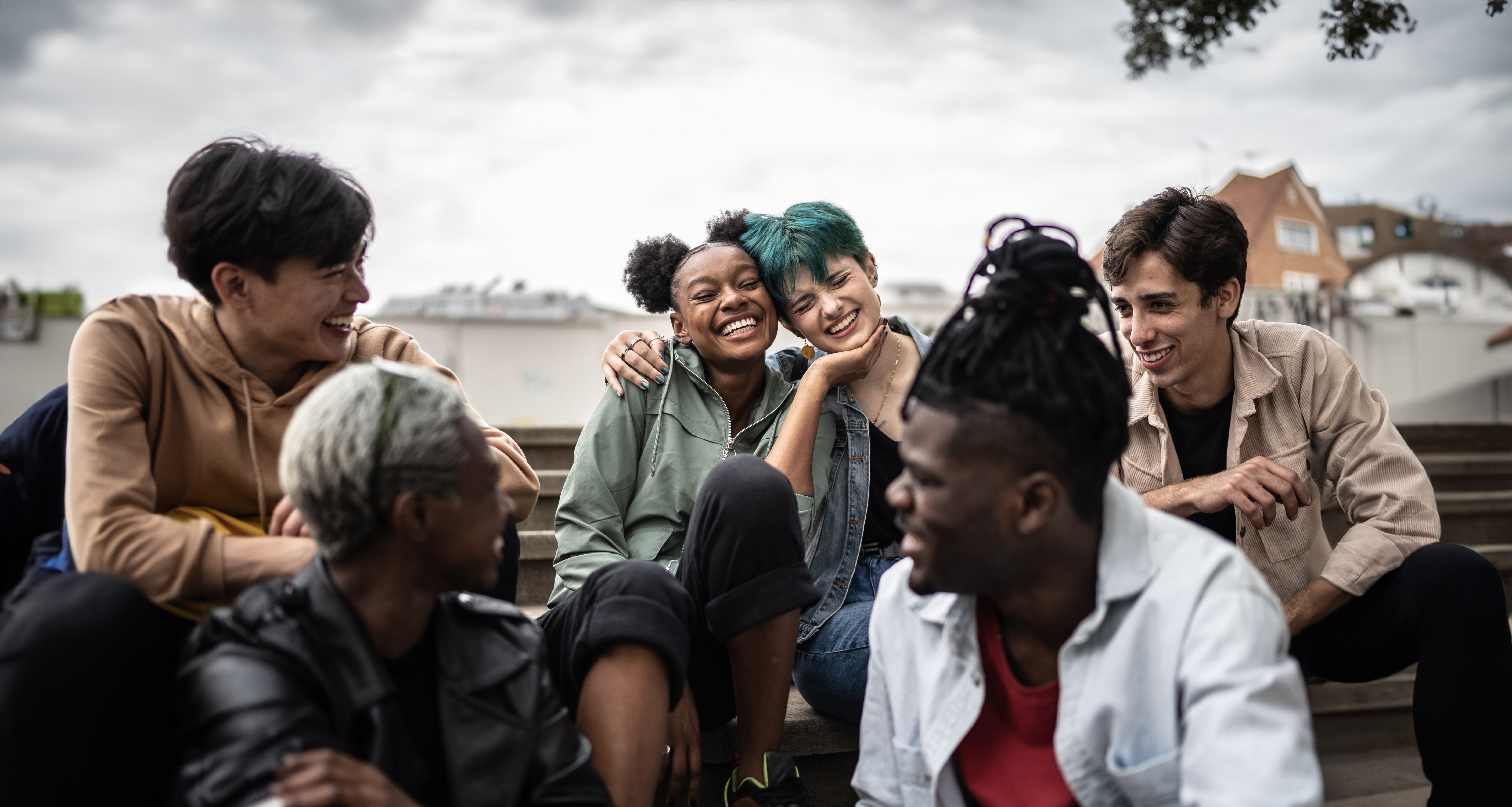 Friends talking in the street